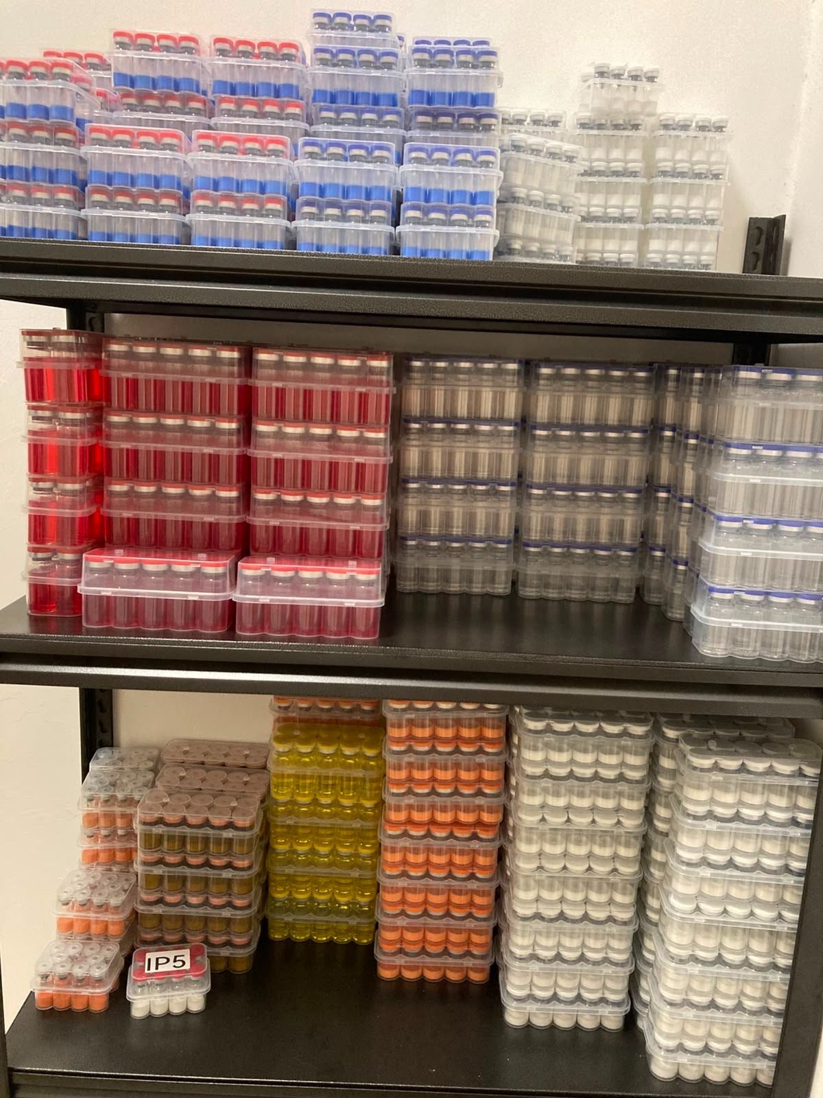 Manufacturer stock: 10‑vial kits on shelving